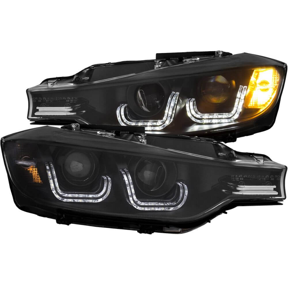Anzo 121504 Projector Headlight Set - Clear Lens - Black Housing - Pair - w/U-Bar